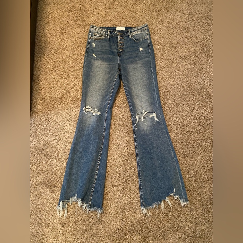 Buckle ripped jean flares